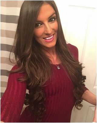 Happy customer's selfie after hair extensions installation at our professional beauty salon in Orleans, Ottawa.